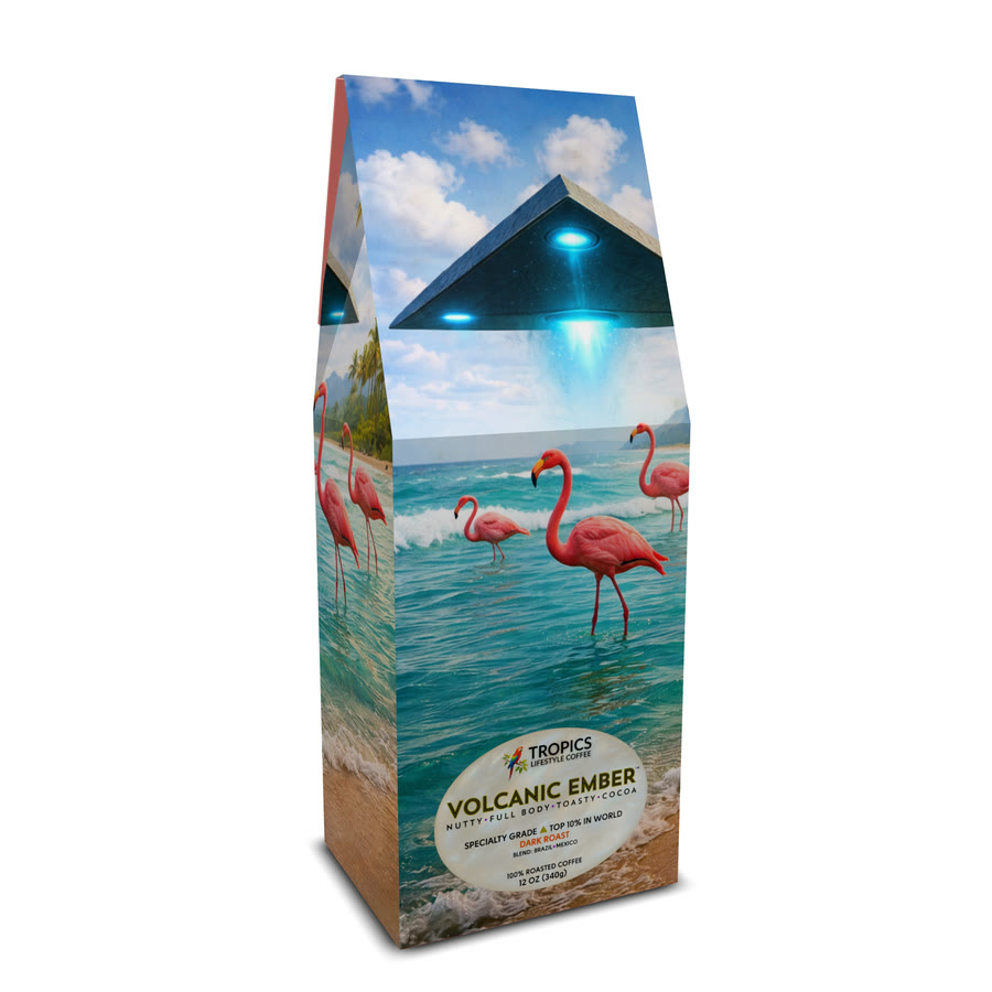 The Tropics Lifestyle Coffee listing photo: the Volcanic Ember art box with flamingos and a UFO on the front.